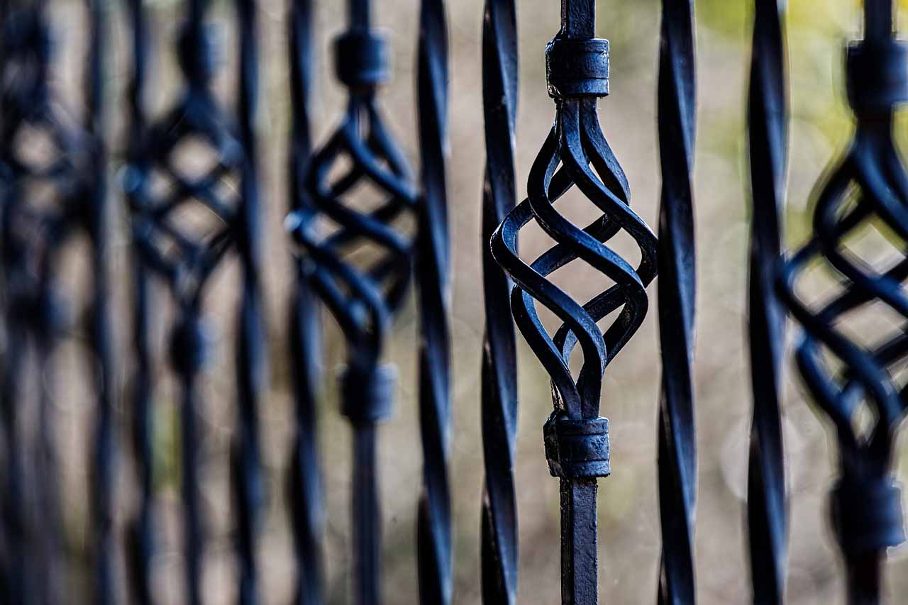 Close up shot of wrought iron fence